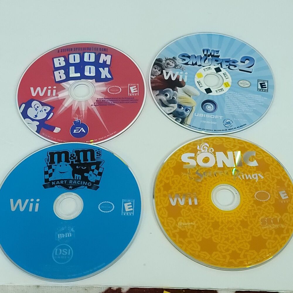 Nintendo Wii Games Lot of 4 Bundle M&M Kart Racing Boom Blox Smurfs 2 Sonic Ring